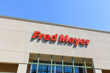 A photo showing the Fred Meyer logo on its store.